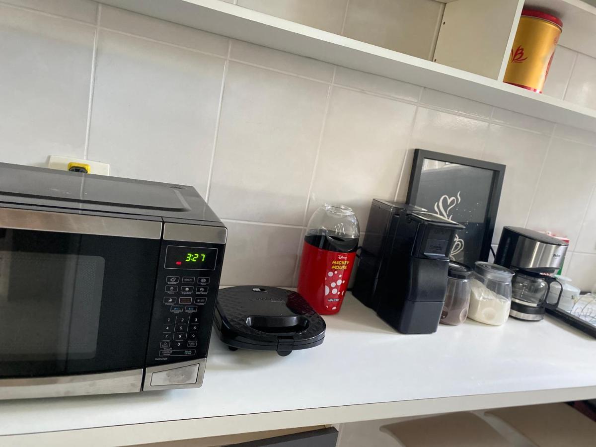 Apartamento até 10 pessoas na enseada Guarujá em condomínio clube praia piscinas salão jogos quadra futebol campo parquinho brinquedos Wi-fi Home office Exterior foto