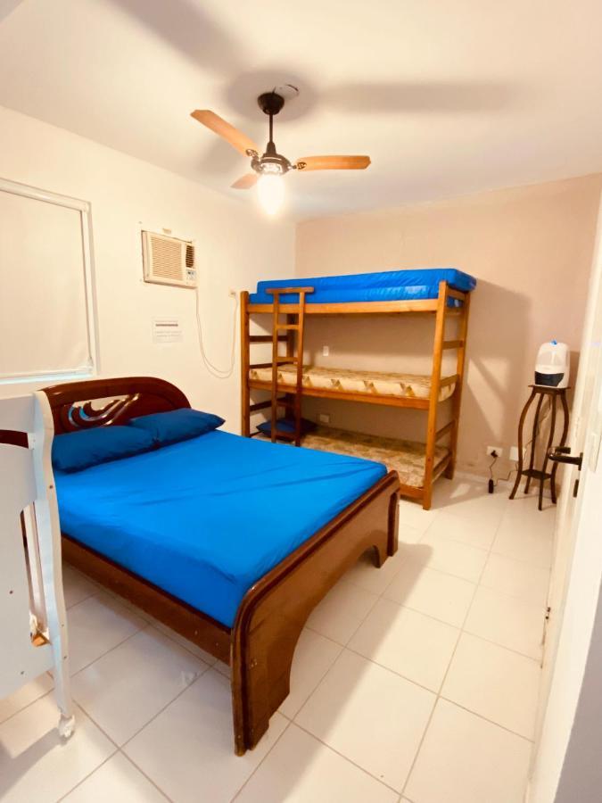 Apartamento até 10 pessoas na enseada Guarujá em condomínio clube praia piscinas salão jogos quadra futebol campo parquinho brinquedos Wi-fi Home office Exterior foto