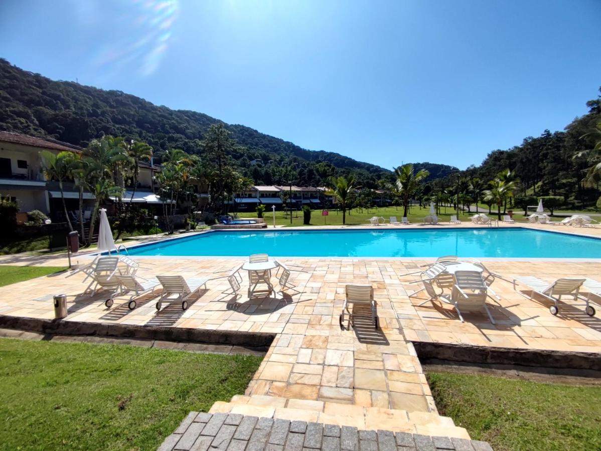 Apartamento até 10 pessoas na enseada Guarujá em condomínio clube praia piscinas salão jogos quadra futebol campo parquinho brinquedos Wi-fi Home office Exterior foto